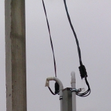 Счетчик Матрица на трубостойке в поселке Брикет производили электромонтажные работы.