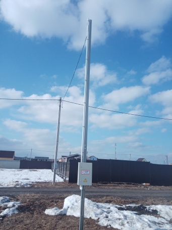 Электрический столб через дорогу 7м 2026г